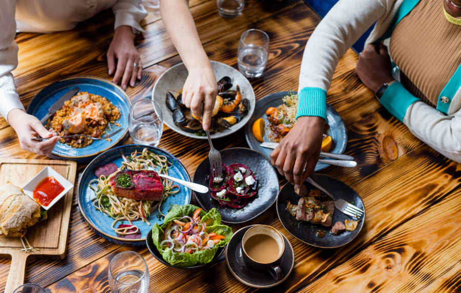 Residents eating at a local restaurant near Cottage Street at eTown in Jacksonville, Florida