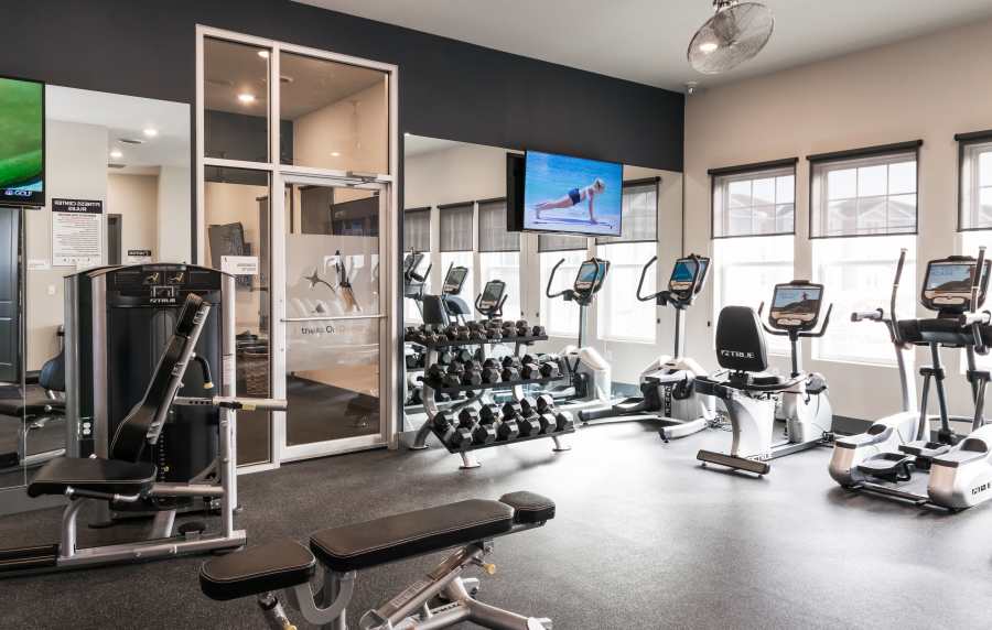 Fitness center with gym equipment's at Altair At The Preserve in O'Fallon, Missouri