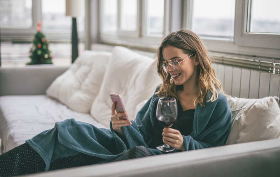 Resident watching mobile at Bridges at San Ramon in San Ramon, California