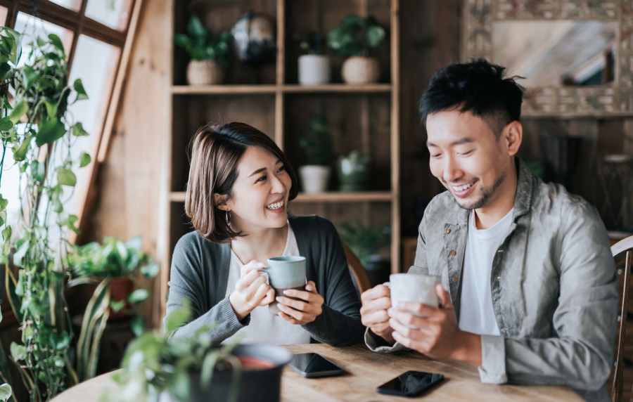 Couple having coffee at a cafe near Luxe @ Ocotillo in Chandler, Arizona, 
