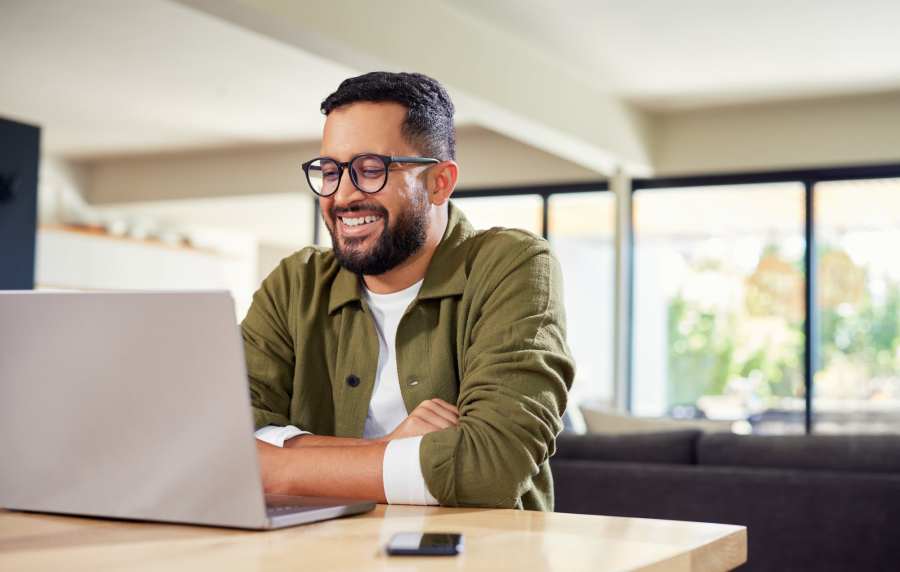 Resident working in laptop near Walnut Springs in Seguin, Texas