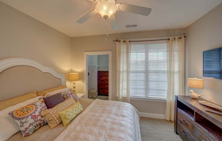 Well-lit bedroom at Red Knot at Edinburgh in Chesapeake, Virginia