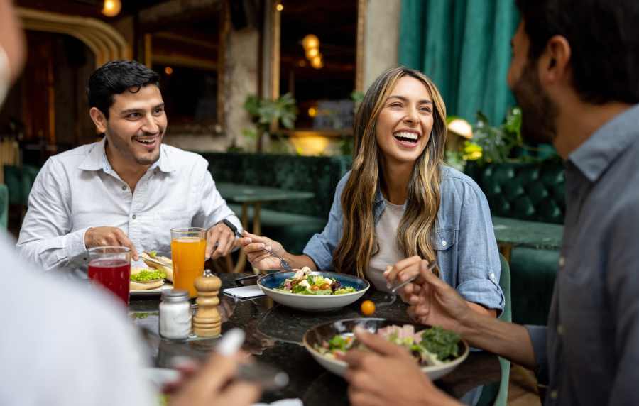 Friends enjoying thier time while having lunch near Walnut Springs in Seguin, 