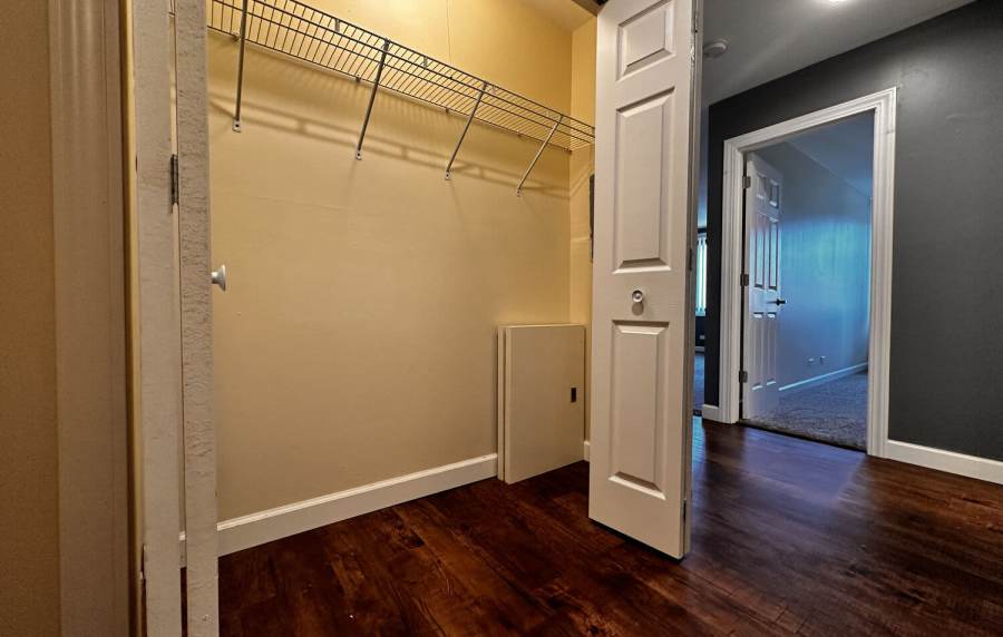 Walk-in closet at Main Street Apartments in Bensenville, Illinois