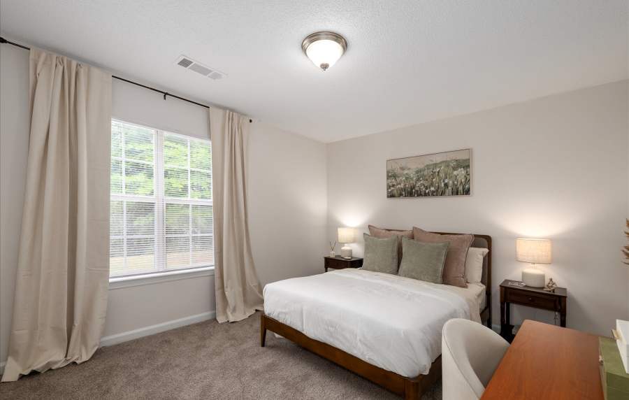 Elegant minimalist bedroom at The Grove at Greenleaf in Conyers, Georgia