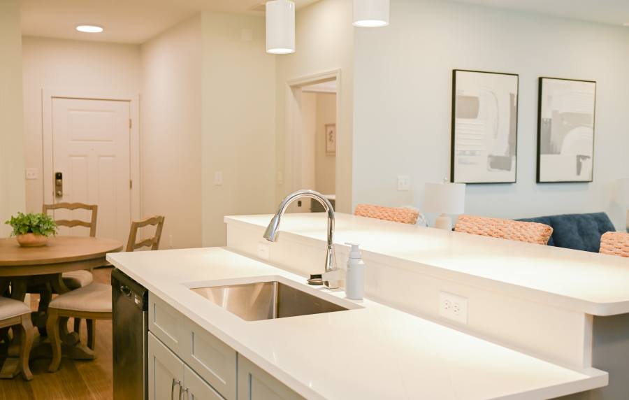 Kitchen with raised countertop  at Anchor Apartments in Freeport, Florida