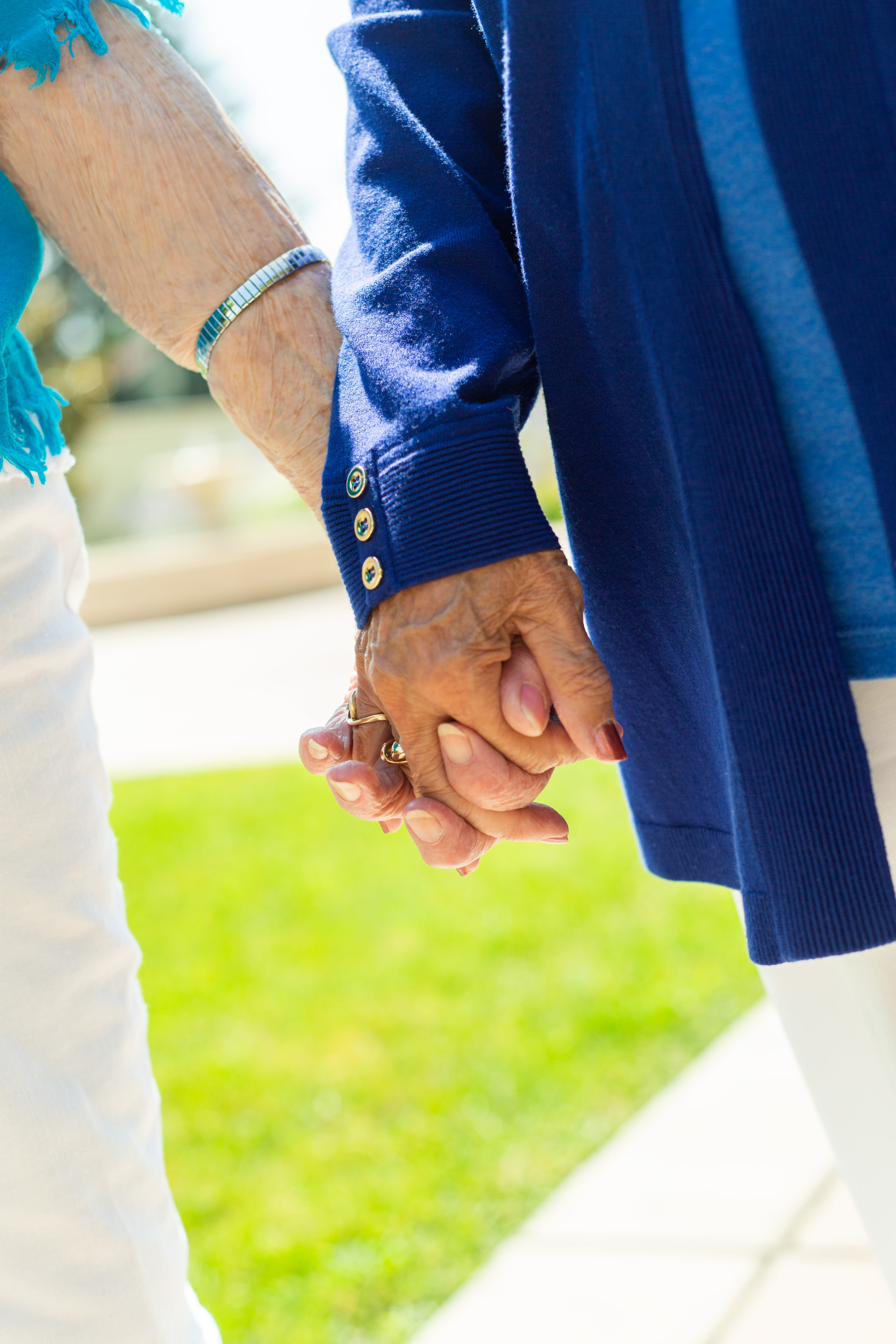 A resident putting flowers in a vase at Mission Ridge in Springfield, Missouri. 