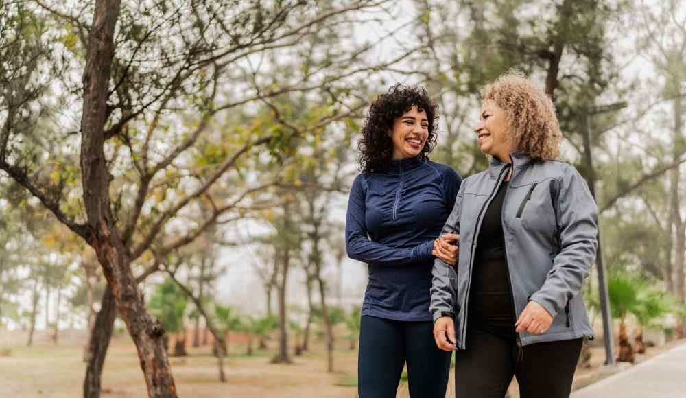 Friends hanging out around a firepit at White Oaks West in Gates, New York 