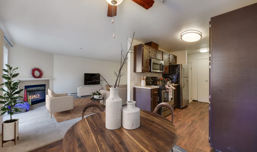 kitchen, living room with fireplace and dining room view