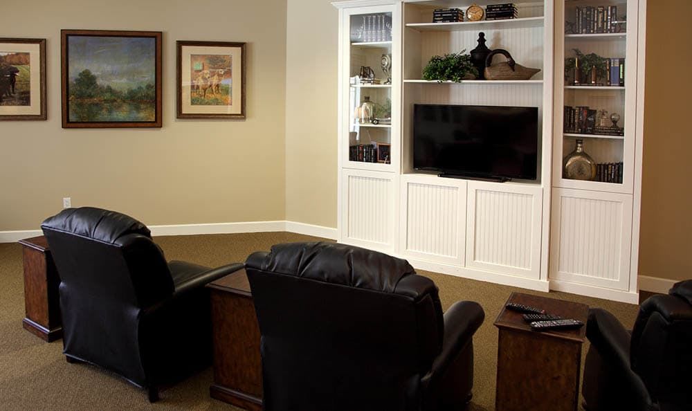 Tv room with recliner chairs at Glenwood in Dublin, Ohio