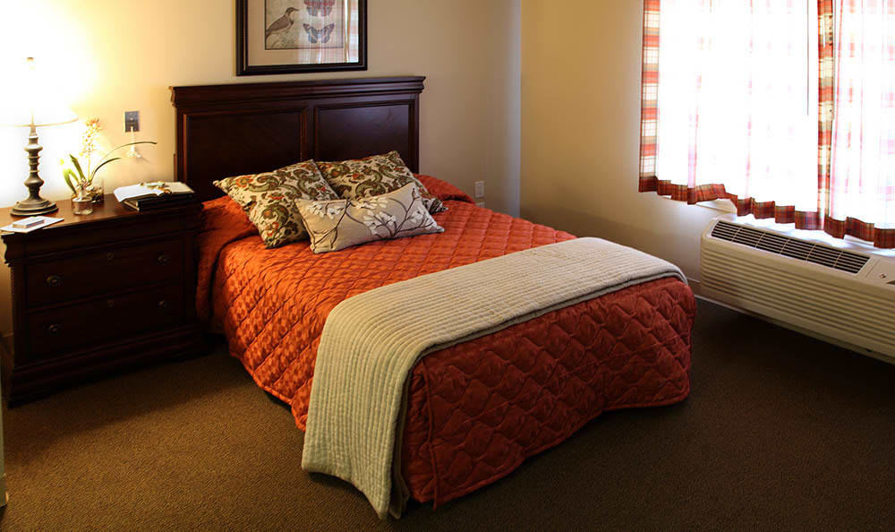 Bed in a 1 bedroom senior apartment at Glenwood in Dublin, Ohio