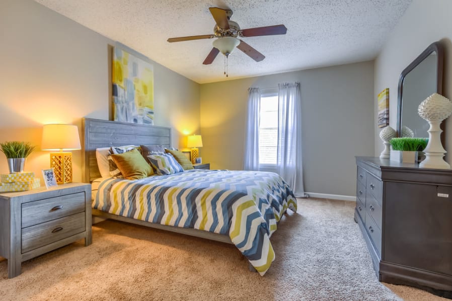 Furnished model apartment bedroom at Northbrook and Pinebrook in Ridgeland, Mississippi