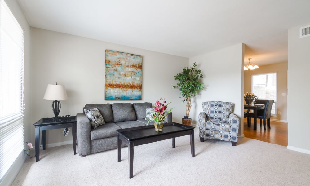 Bright living room at Castlegate Windsor Park Apartments in Columbus