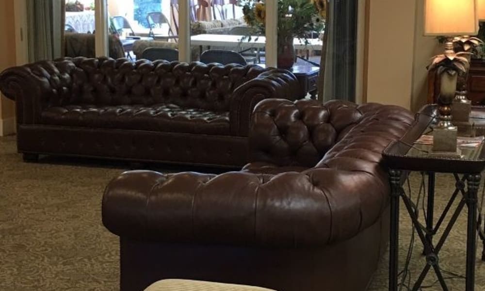 A lounge with comfortable seating at Atlantic at Charter Colony in Midlothian, Virginia