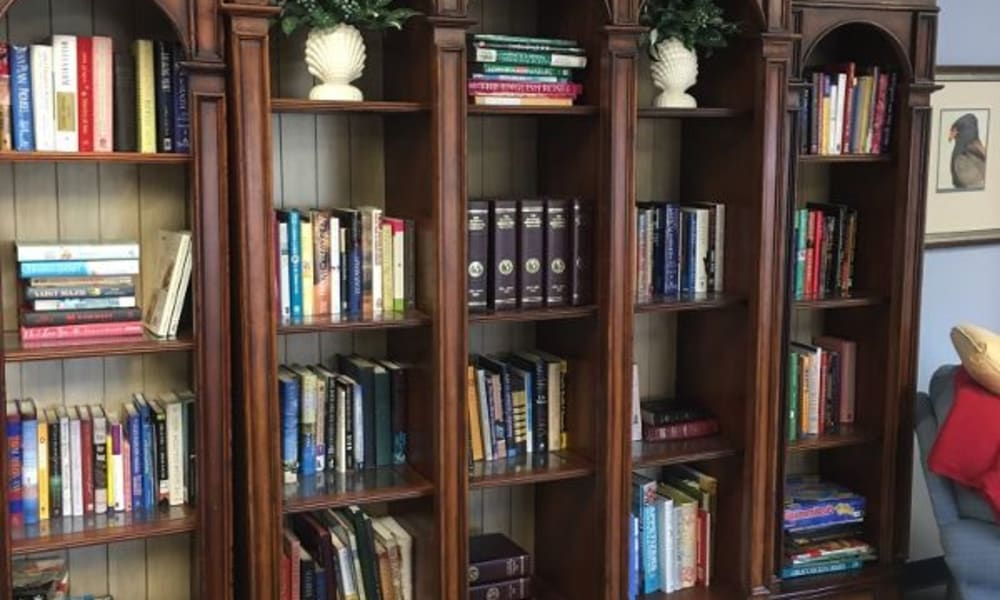 A full bookshelf in the onsite library at Atlantic at Charter Colony in Midlothian, Virginia