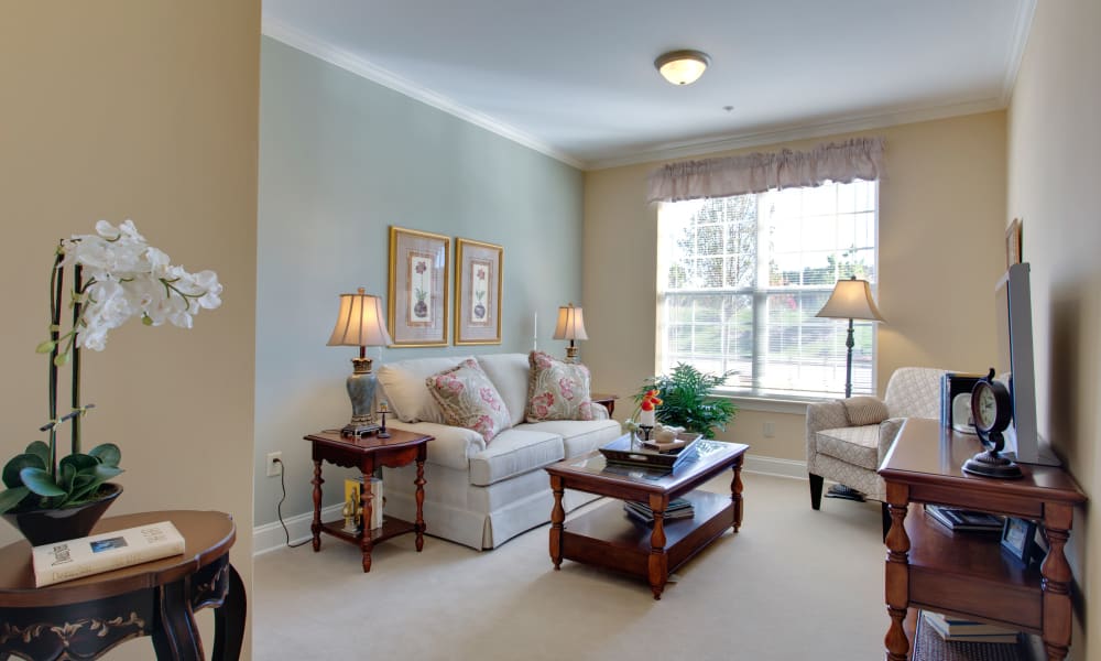 Well lit living space at Waltonwood Cary Parkway