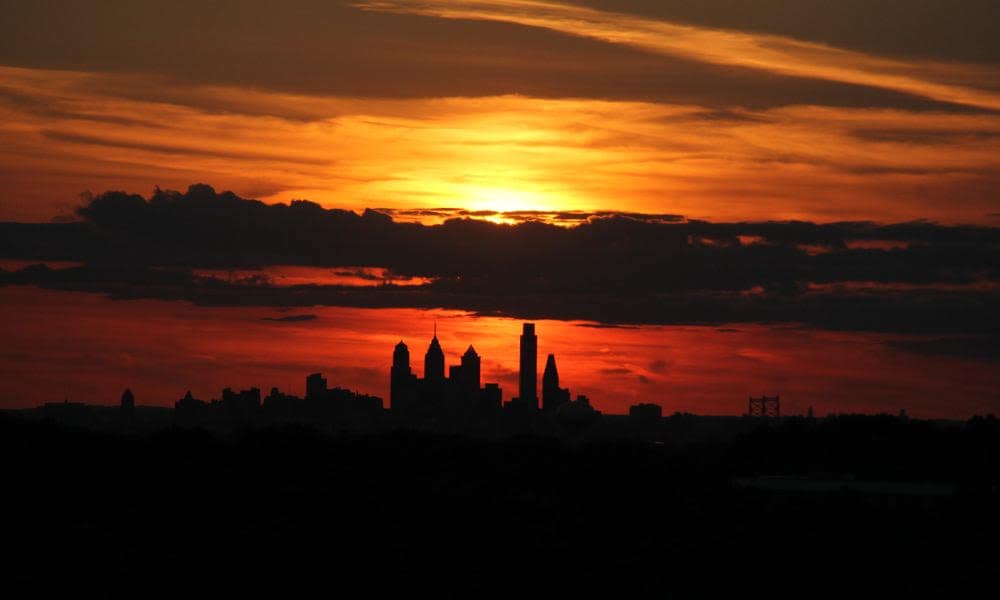 Setting sun above the city skyline in Cherry Hill, NJ