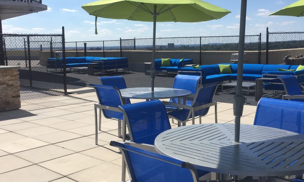rooftop tables and chairs at The Carlyle Apartments in Baltimore, MD