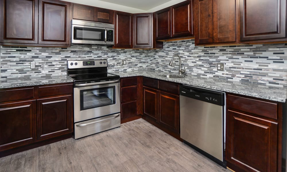 Place One Apartment Homes offers a renovated kitchen in Plymouth Meeting, Pennsylvania