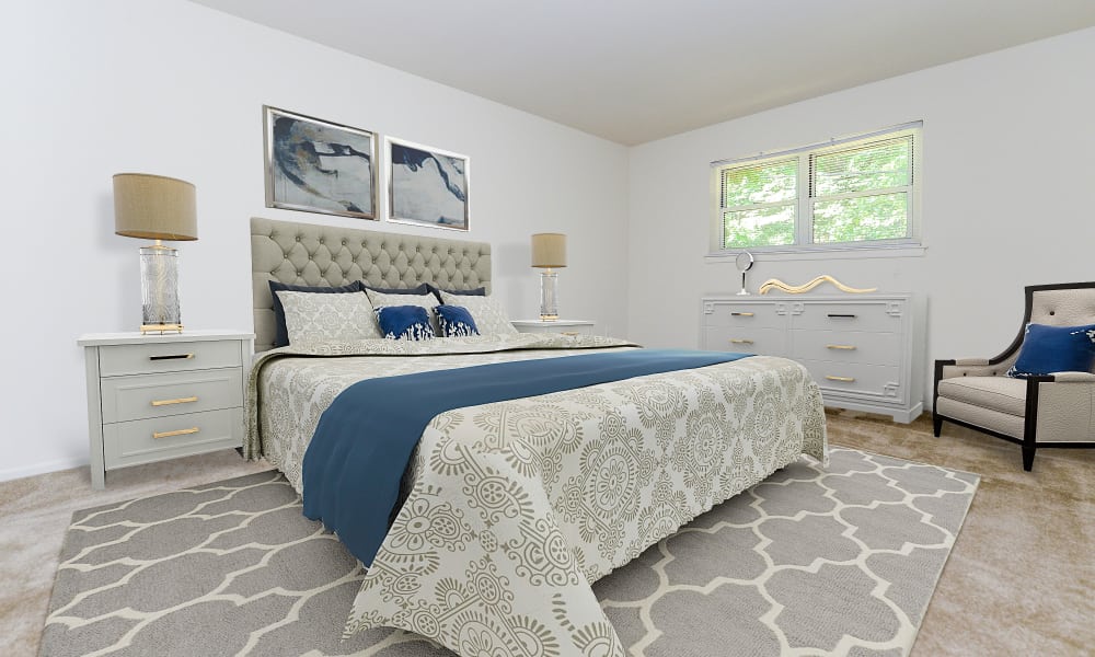 Cozy bedroom at Mt. Arlington Gardens Apartment Homes in Mt. Arlington, New Jersey