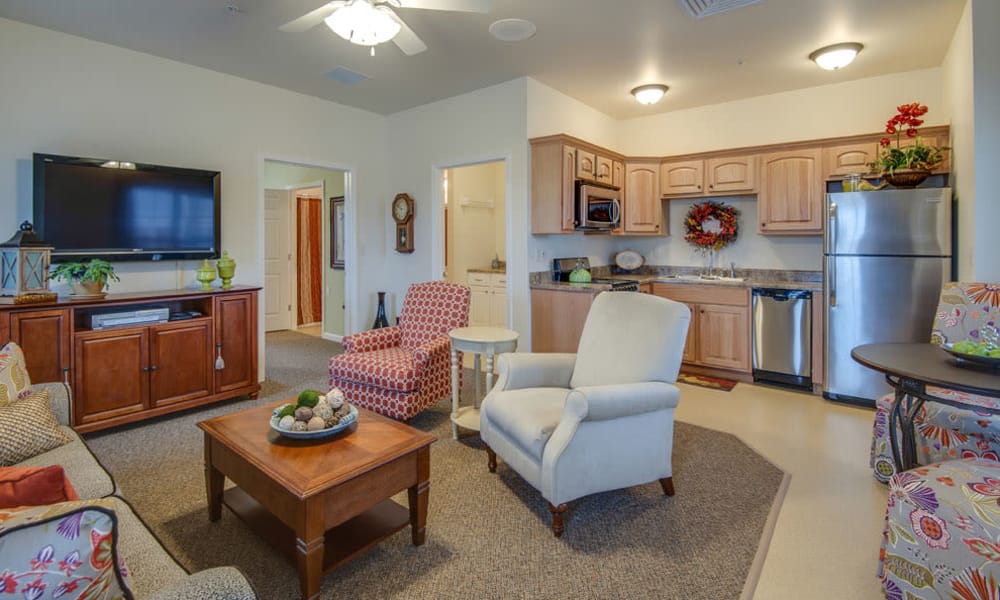 La Bonne Maison Senior Living in Sikeston, Missouri offers an open living room and a full kitchen