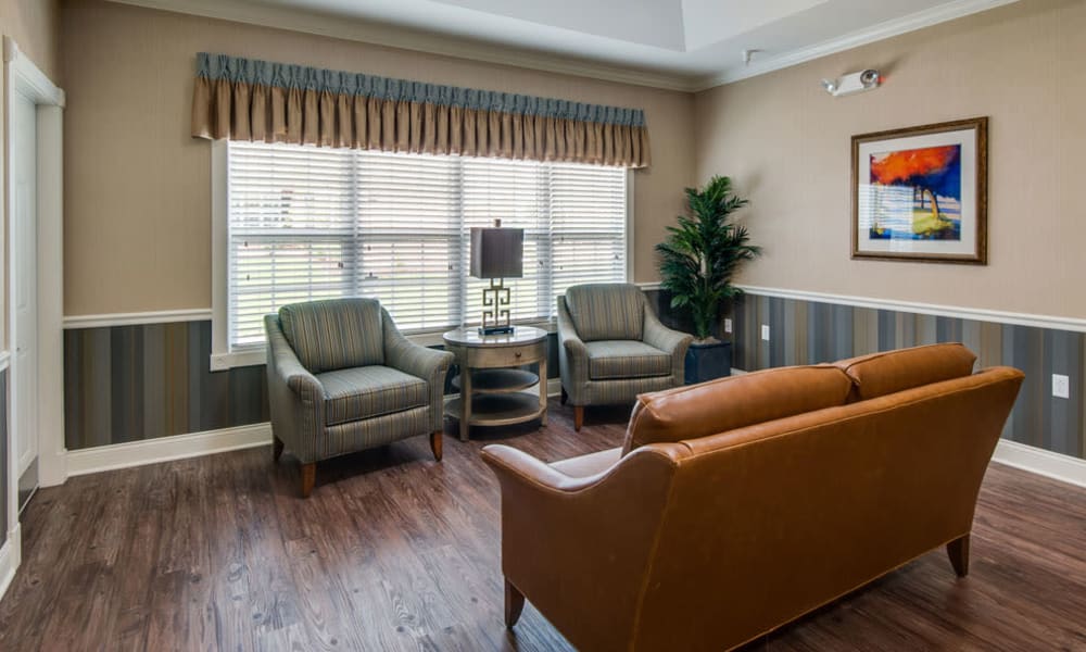 Seating area with hardwood flooring at Centennial Pointe Senior Living in Springfield, Illinois
