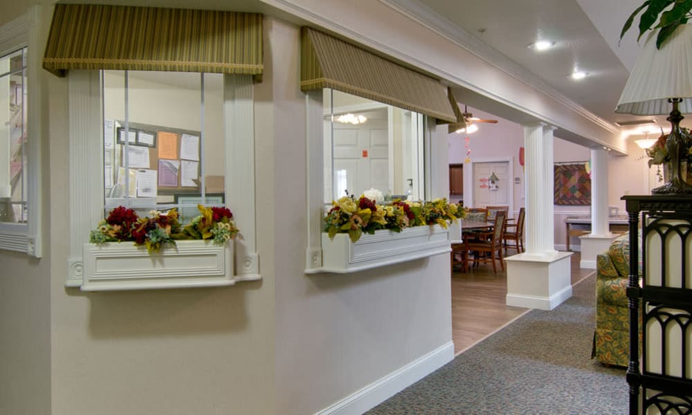 Reception area with a view of the dining room at Silver Creek Senior Living in Joplin, Missouri