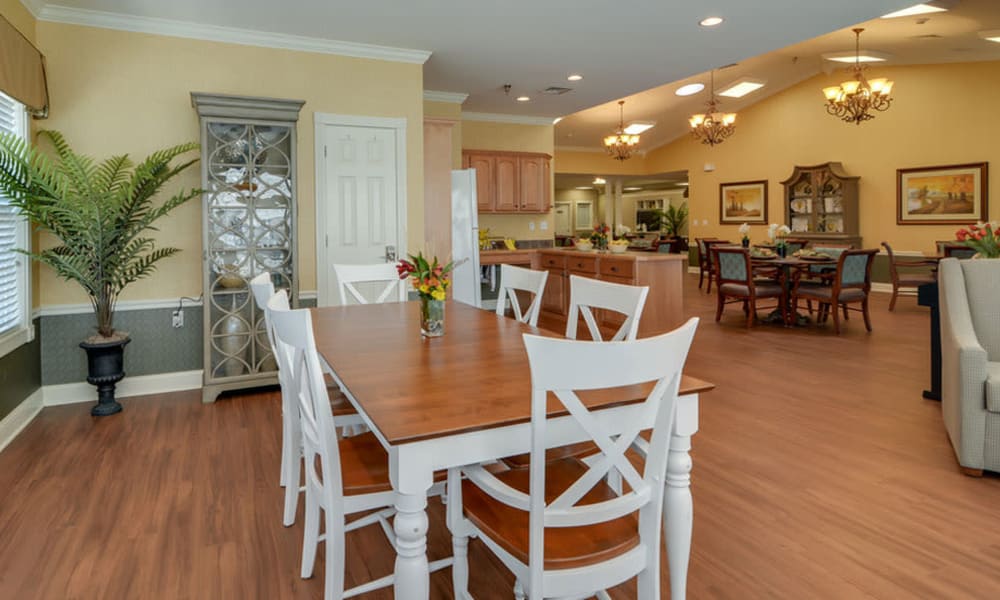 Community kitchen next to the family dining area at Colony Pointe Senior Living in Columbia, Missouri