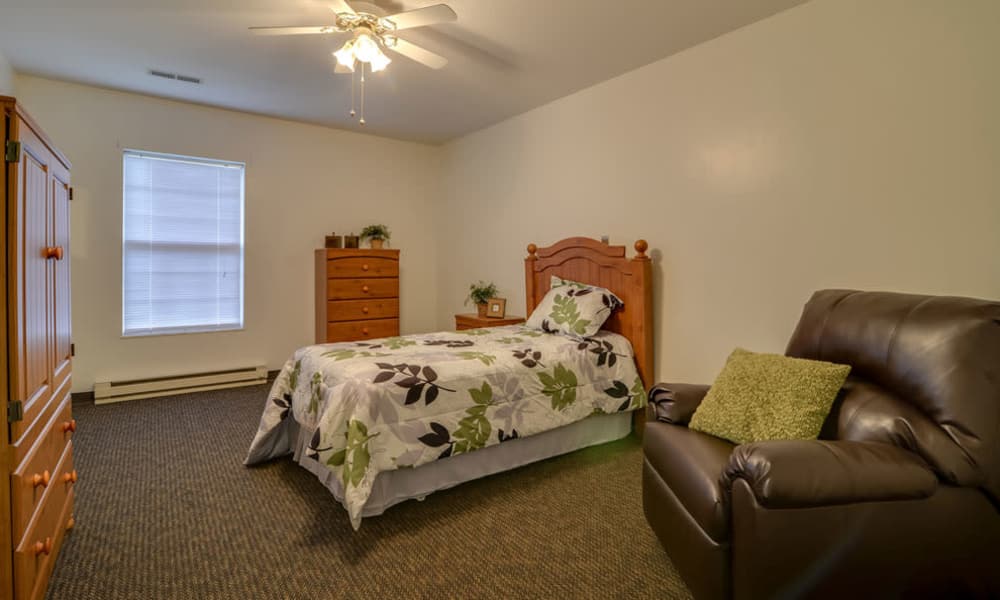 Assisted living bedroom at Ashbrook in Farmington, Missouri
