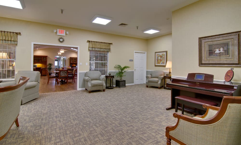 Music room with comfortable seating at Maple Tree Terrace in Carthage, Missouri