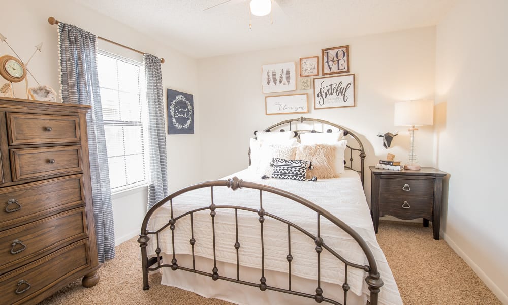 An apartment bedroom at Waters Edge in Oklahoma City, OK