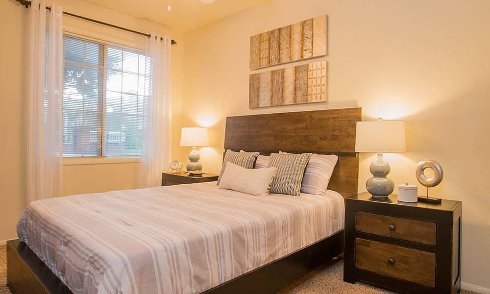 An apartment bedroom at The Courtyards in Tulsa, OK
