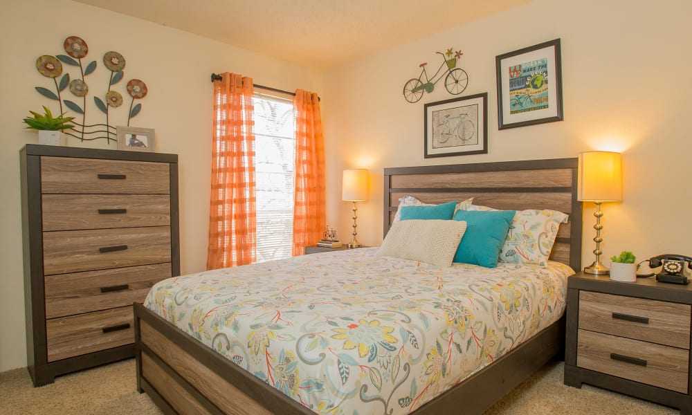 A large bed in an apartment at Country Hollow in Tulsa, OK