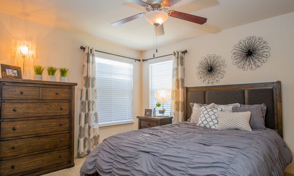 An apartment bedroom at Nickel Creek Apartments in Tulsa, Oklahoma