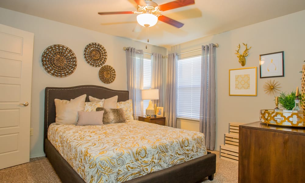 An apartment bedroom at Icon at Broken Arrow in Broken Arrow, Oklahoma