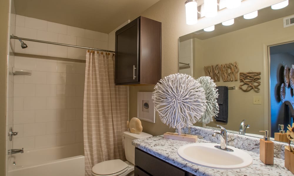An apartment bathroom at Icon at Broken Arrow in Broken Arrow, Oklahoma