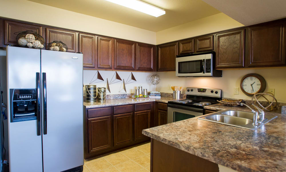 An apartment kitchen at Tuscany Hills in Tulsa, Oklahoma