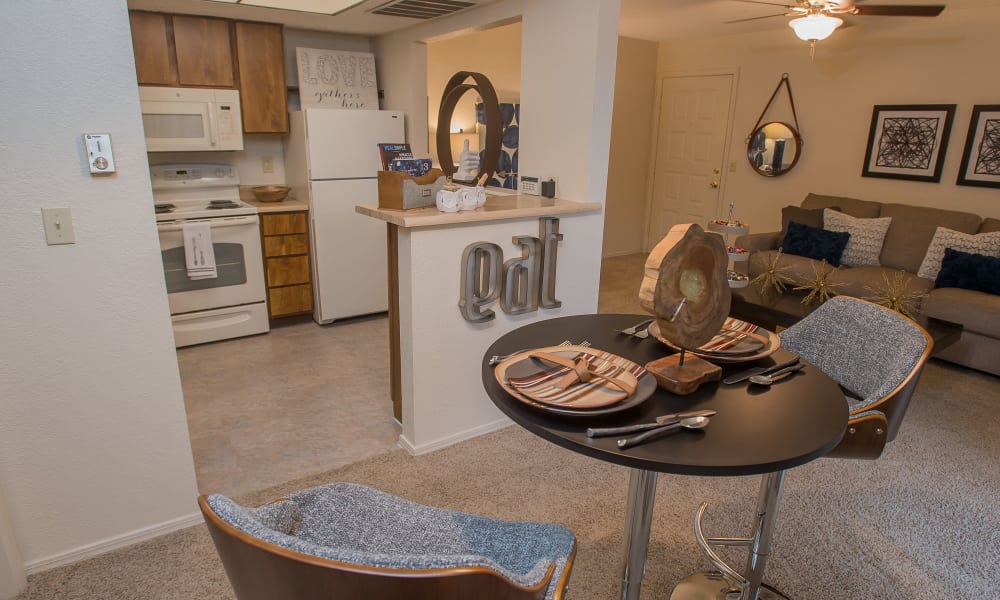An apartment dining table at Woodscape Apartments in Oklahoma City, OK