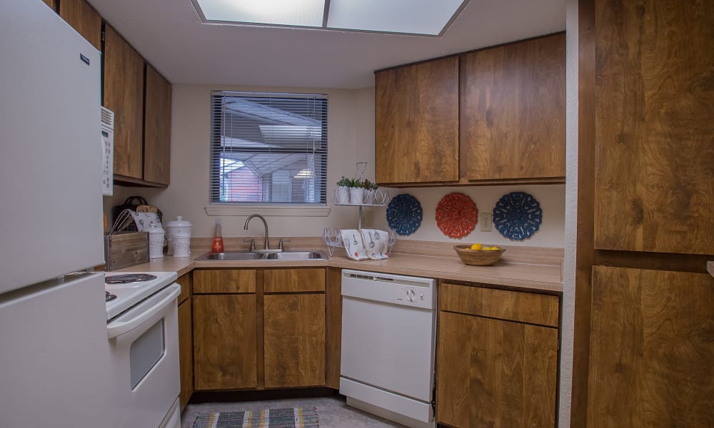 An apartment kitchen at Woodscape Apartments in Oklahoma City, OK