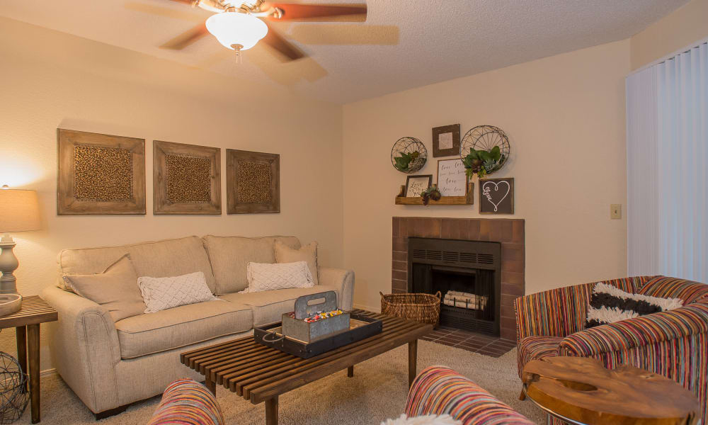 An apartment living room at Woodscape Apartments in Oklahoma City, OK