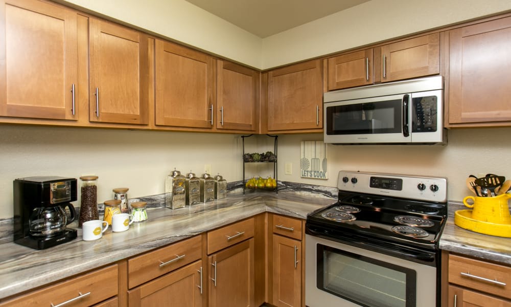 Kitchen with plenty of cabinet space at Tuscana Bay Apartments in Corpus Christi, Texas