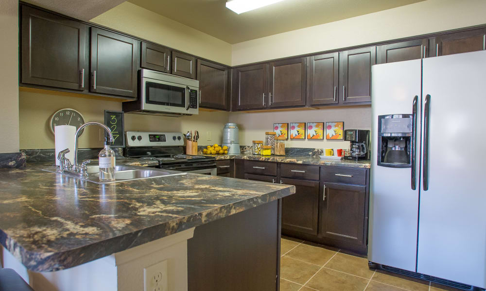 Kitchen at Mission Point Apartments in Moore, Oklahoma
