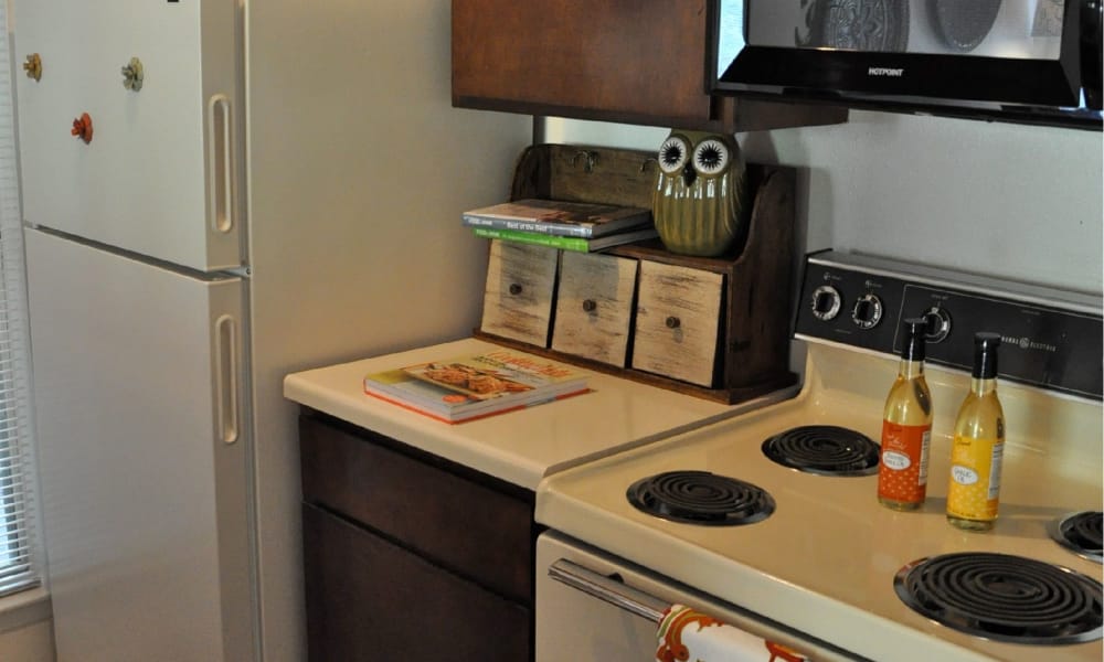 An apartment kitchen at The Chimneys Apartments in El Paso, Texas