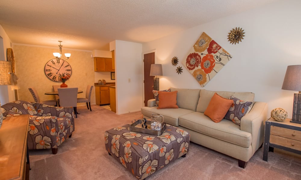 A bright apartment living room at Sunchase Ridgeland Apartments in Ridgeland, MS