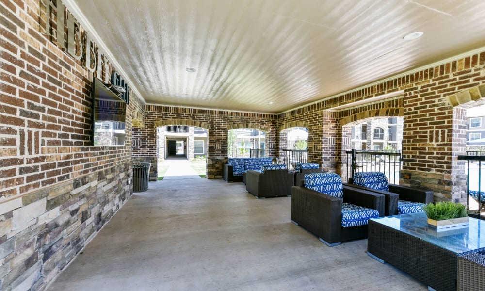 Outdoor seating area at Cottages at Abbey Glen Apartments in Lubbock, Texas
