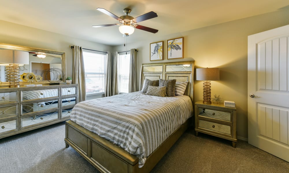 Cozy bedroom at Cottages at Abbey Glen Apartments in Lubbock, Texas