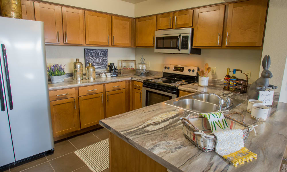 Kitchen with plenty of cabinet space at Icon at Norman in Norman, Oklahoma