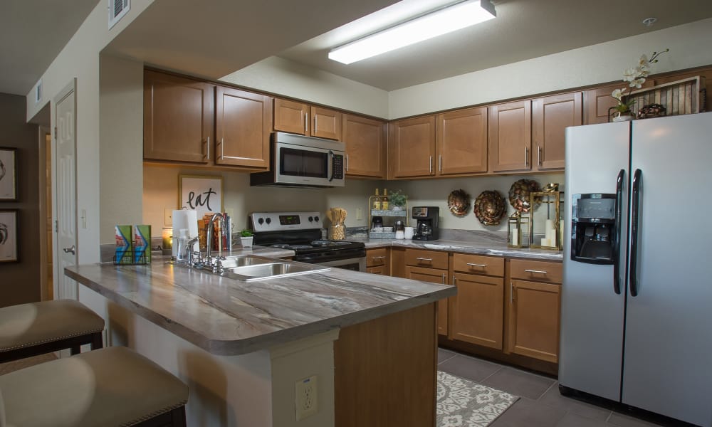 Fully equipped kitchen with granite counters at Tuscany Ranch in Waco, Texas