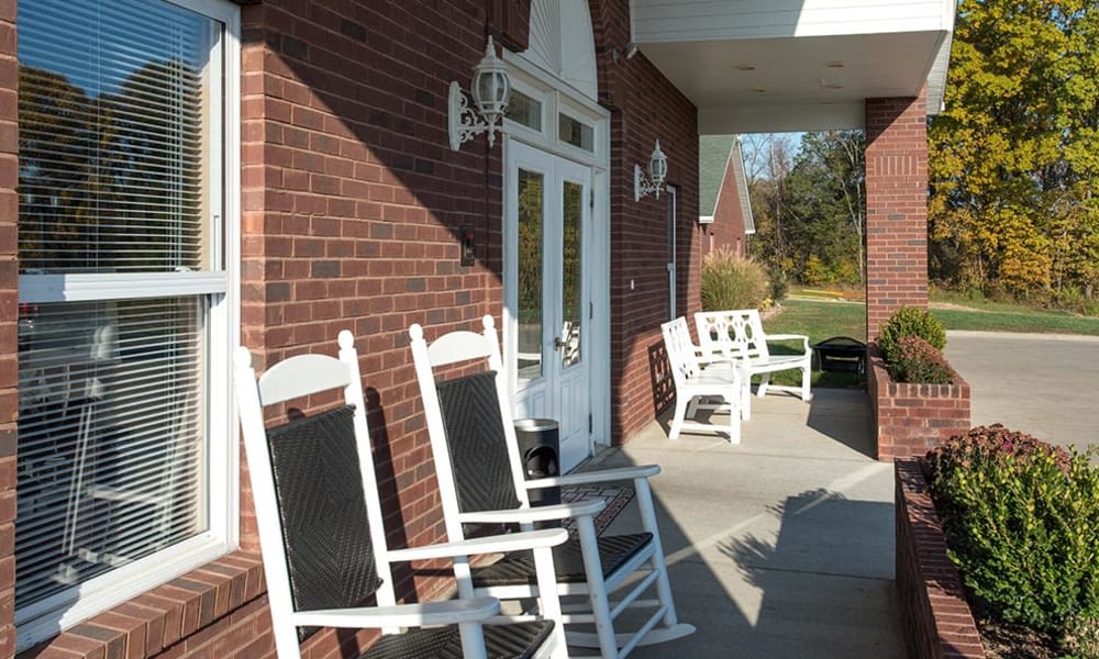 Porch seating in front of Victorian Place of Washington Senior Living in Washington, Missouri
