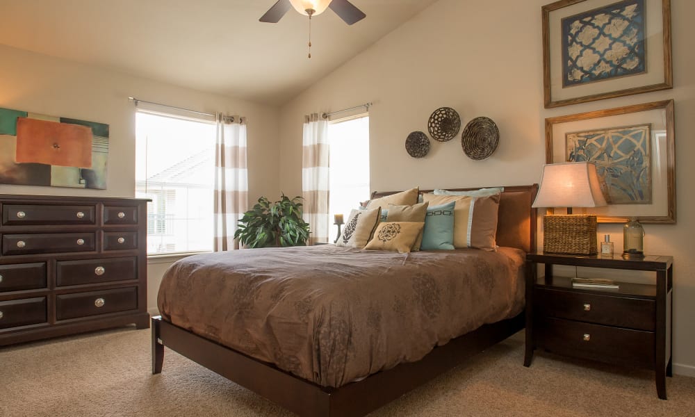 An apartment bedroom at Villas at Stonebridge in Edmond, Oklahoma